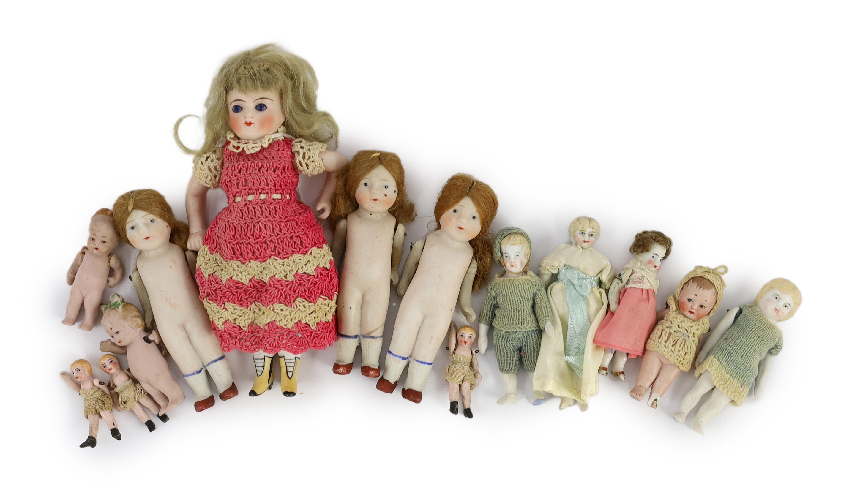 A group of thirteen all-bisque doll’s house dolls, German, early 20th century, tallest 5.5in.